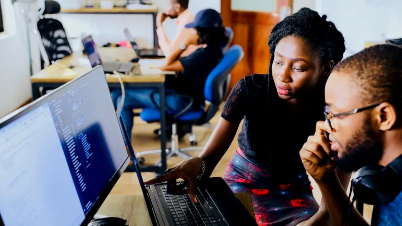 Diverse learners studying cybersecurity together, representing the Webnestify Education non-profit mission to make digital safety training accessible globally