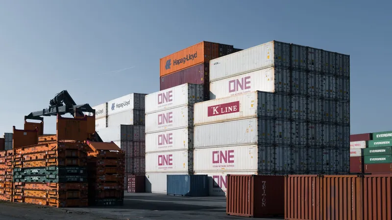 Stacked shipping containers at a terminal, representing free Docker Hardened Images for self-hosted infrastructure