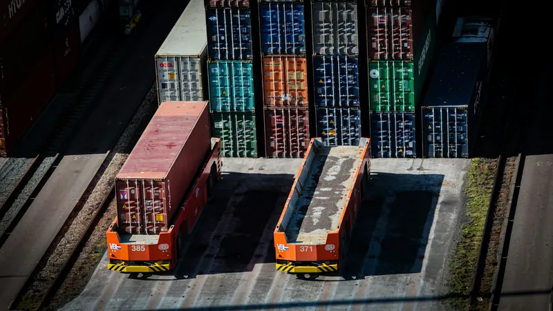 Stacked cargo containers at an automated port, illustrating the Docker hardening covered in this xCloud security review.